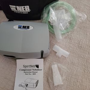 USED TO GIVE BREATHING TREATMENTS/ COMPRESSOR NEBULIZER